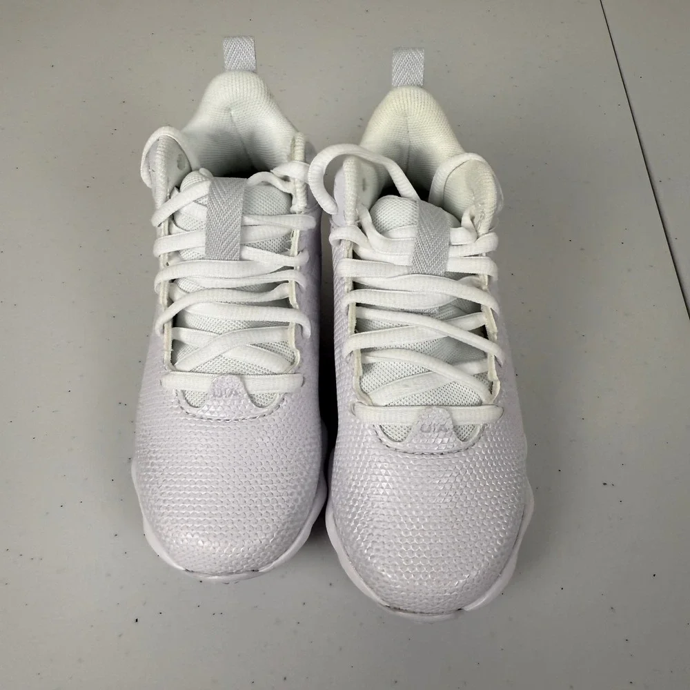 Under Armour White Kids Cleat Sneakers with Silver Logo